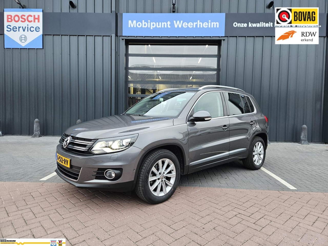 Volkswagen Tiguan - 1.4 TSI Sport&Style AUTOMAAT - AutoWereld.nl