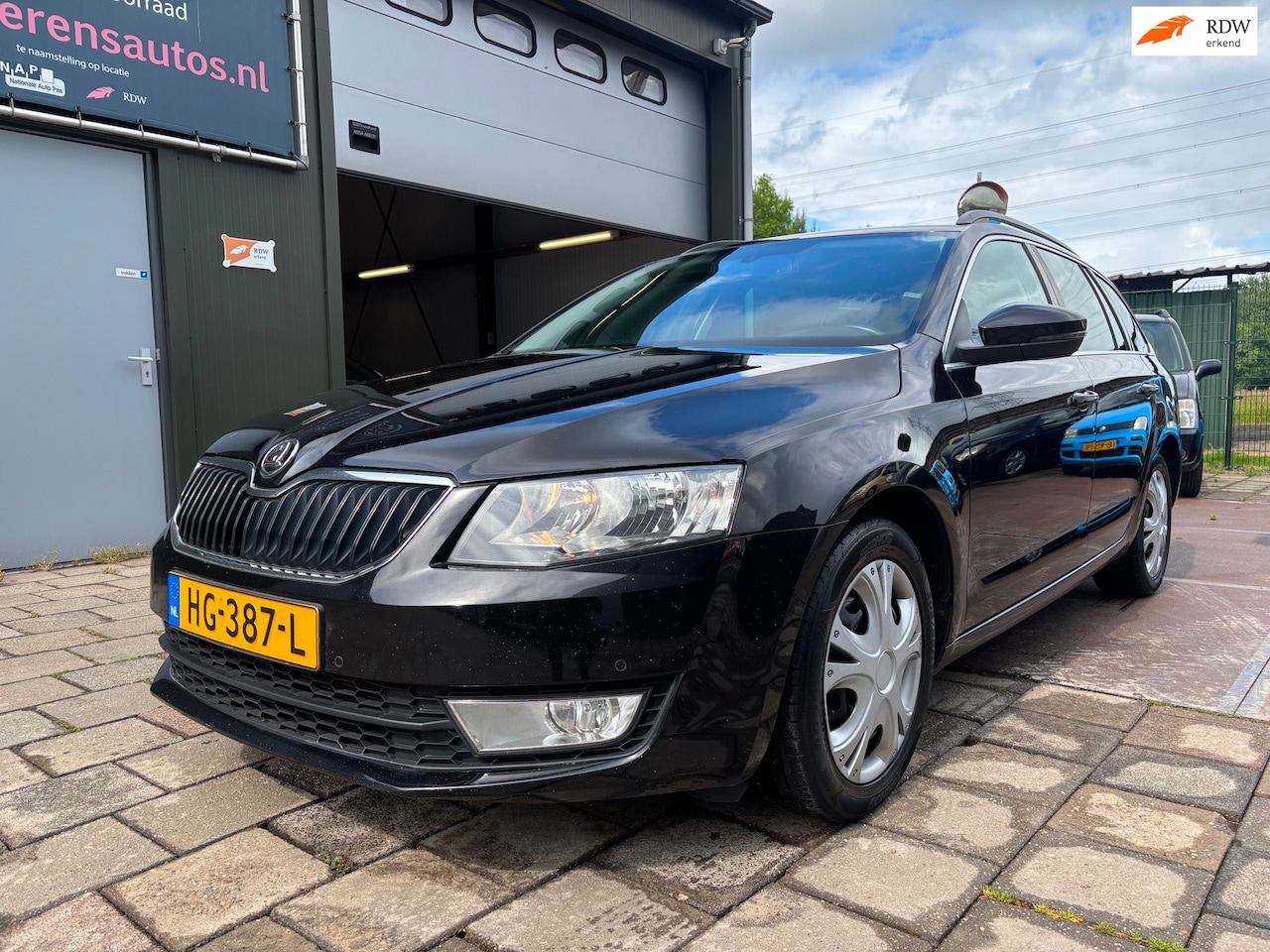 Skoda Octavia Combi - 1.6 TDI Ambition DSG Navi Cruise - AutoWereld.nl