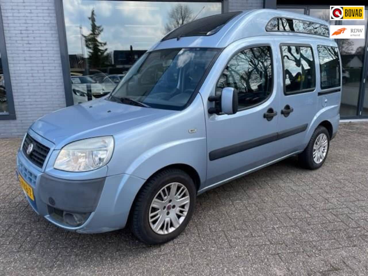 Fiat Doblò - 1.4 Dynamic | Rolstoelauto - AutoWereld.nl