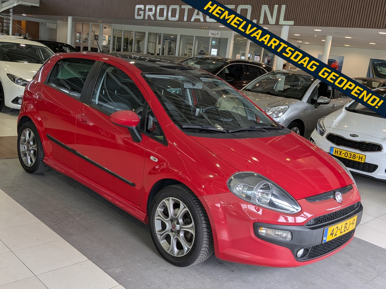 Fiat Punto Evo - 1.4-16V Multiair Racing Airco, Stuurbekrachtiging - AutoWereld.nl