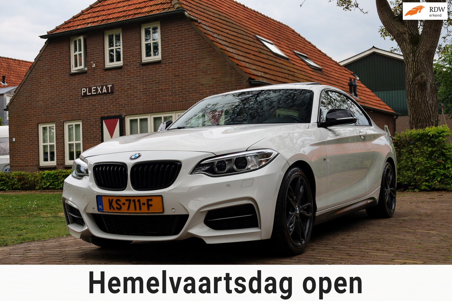 BMW 2-serie Coupé - M235i High Executive | M-pakket | Panorama | HANGESCHAKELD | H&K | Apple Carplay | Stoelve - AutoWereld.nl