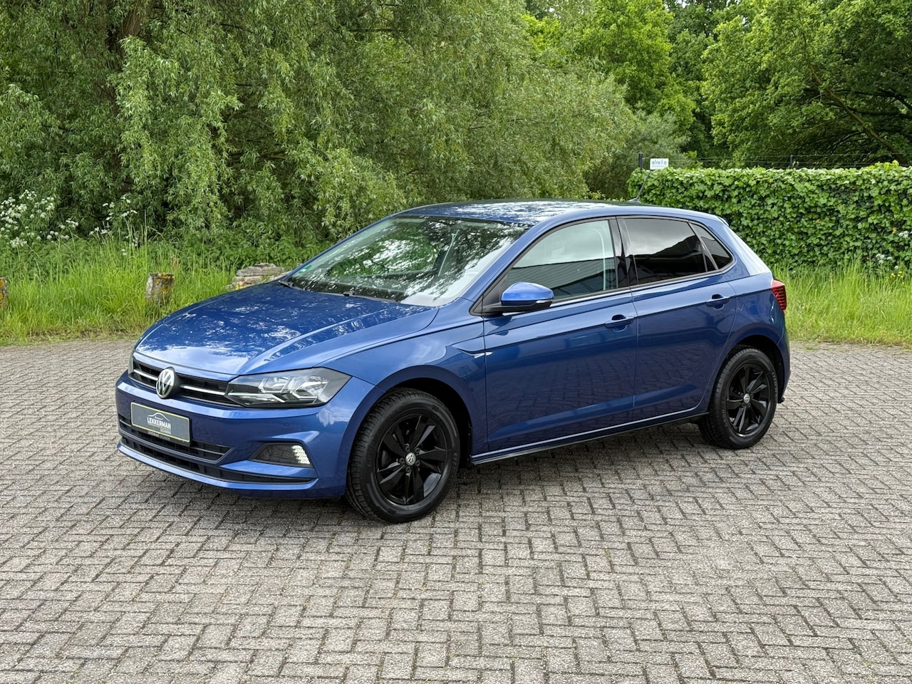 Volkswagen Polo - 1.0 HIGH LINE PDC I CRUISE I NAVIGATIE I STOELVER I CLIMA - AutoWereld.nl