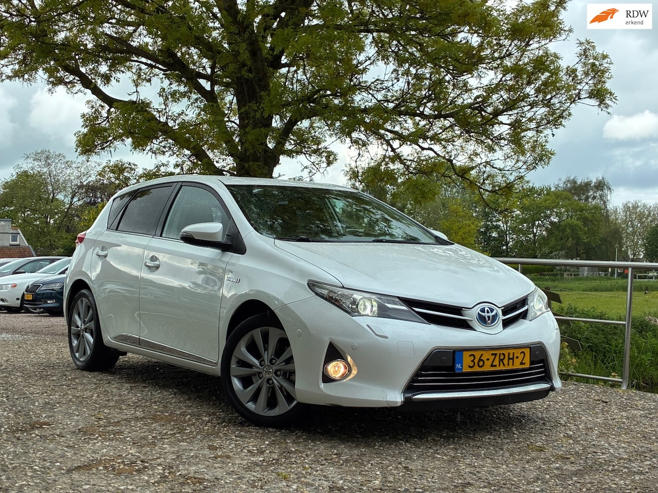 Toyota Auris - 1.8 Hybrid Lease Pro | Half leder + Cruise + Clima nu € 7.975,-!!! - AutoWereld.nl