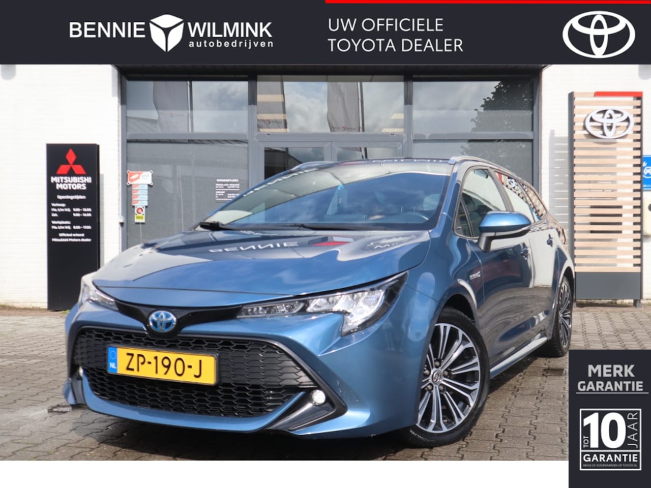 Toyota Corolla Touring Sports - 1.8 Hybrid First Edition Trekhaak | AllSeasons | Carplay - AutoWereld.nl
