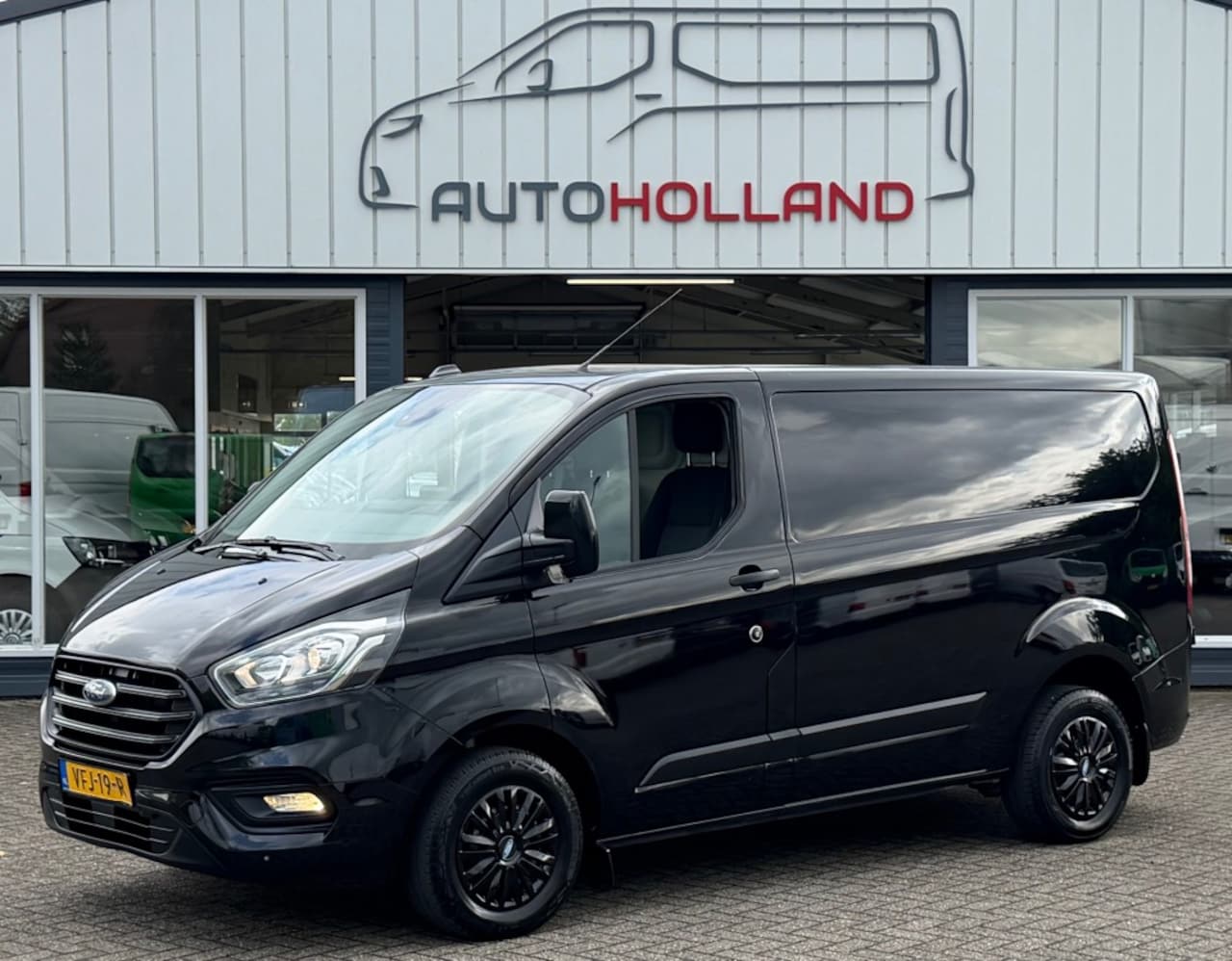 Ford Transit Custom - 2.0 TDCI 77KW 105PK EURO 6 AIRCO/ CRUISE CONTROL/ TREKHAAK/ BIJRIJDERSBANK/ 100% DEALEROND - AutoWereld.nl