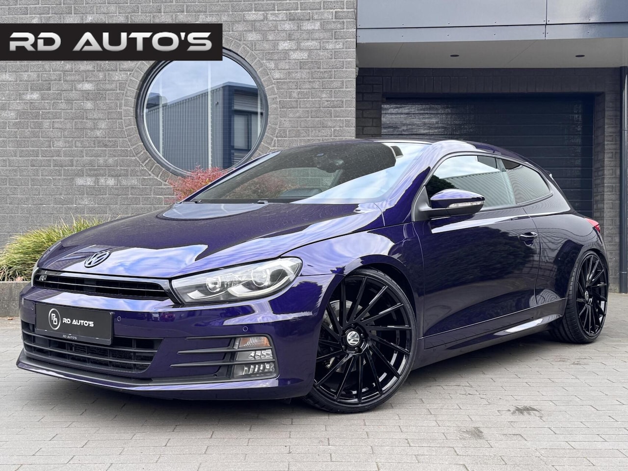 Volkswagen Scirocco - 2.0 TSI DSG R-Line Ultra Violet Metallic Carbon Camera - AutoWereld.nl