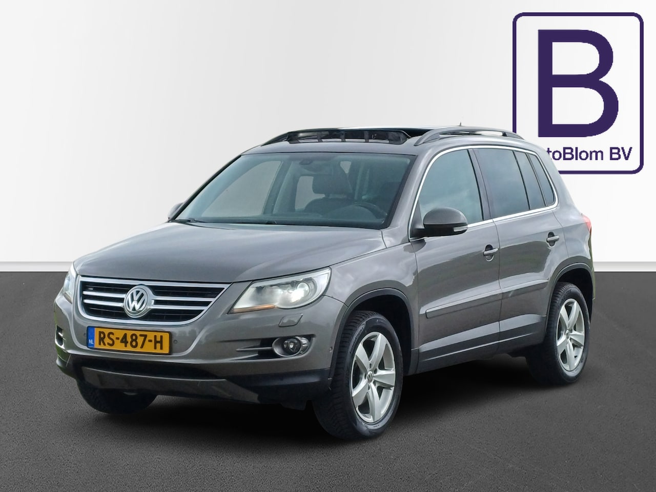 Volkswagen Tiguan - 2.0 TSI Sport&Style 4Motion /Trekh./Pano/Leder/Camera/Top onderhouden/ - AutoWereld.nl