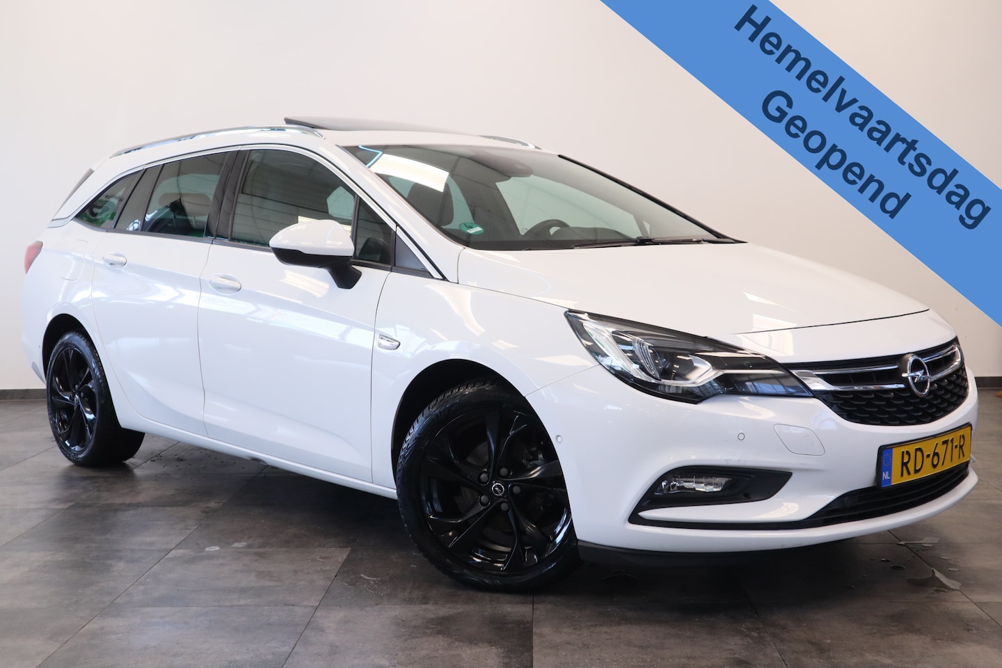 Opel Astra Sports Tourer - 1.4 Innovation Schuifdak Navigatie Camera * Hemelvaartsdag geopend van 12:00 tot 17:00u * - AutoWereld.nl