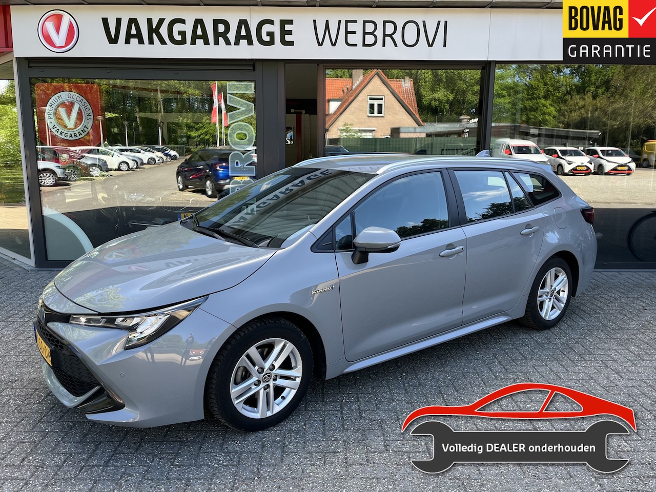 Toyota Corolla Touring Sports - 1.8 Hybrid Business 1e Eign. Trekhaak - AutoWereld.nl