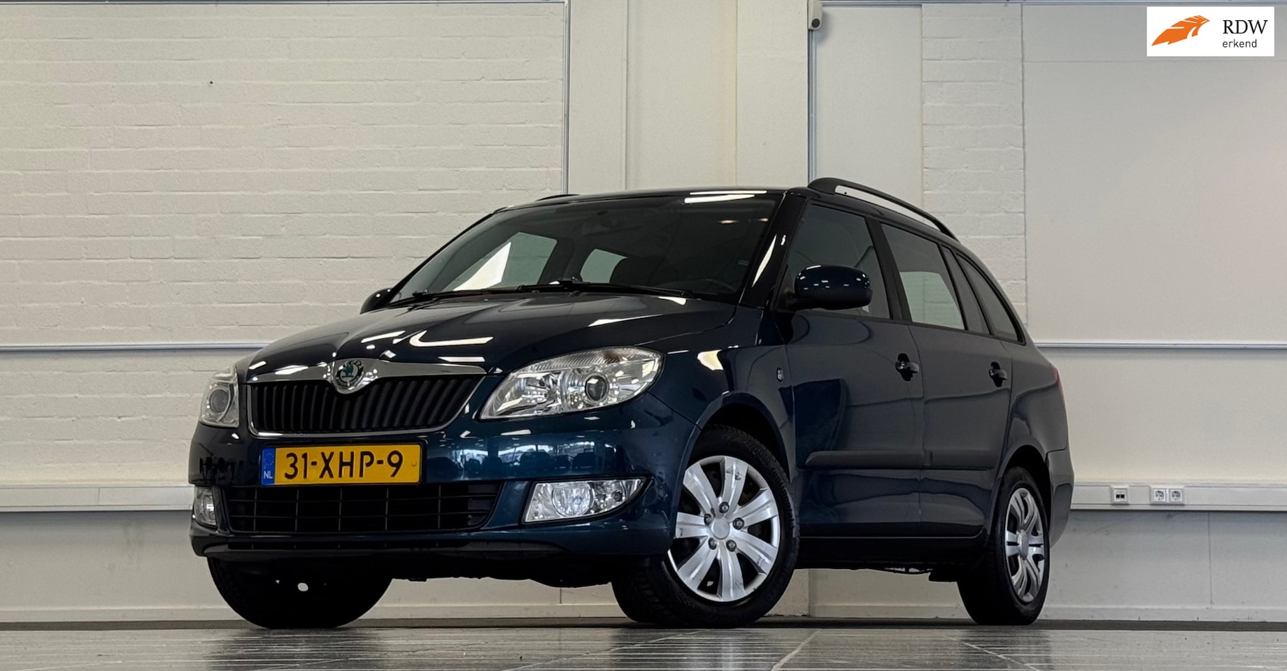 Skoda Fabia Combi - 1.2 TSI Ambition 1e Eigenaar 100% Onderhouden Trekhaak - AutoWereld.nl