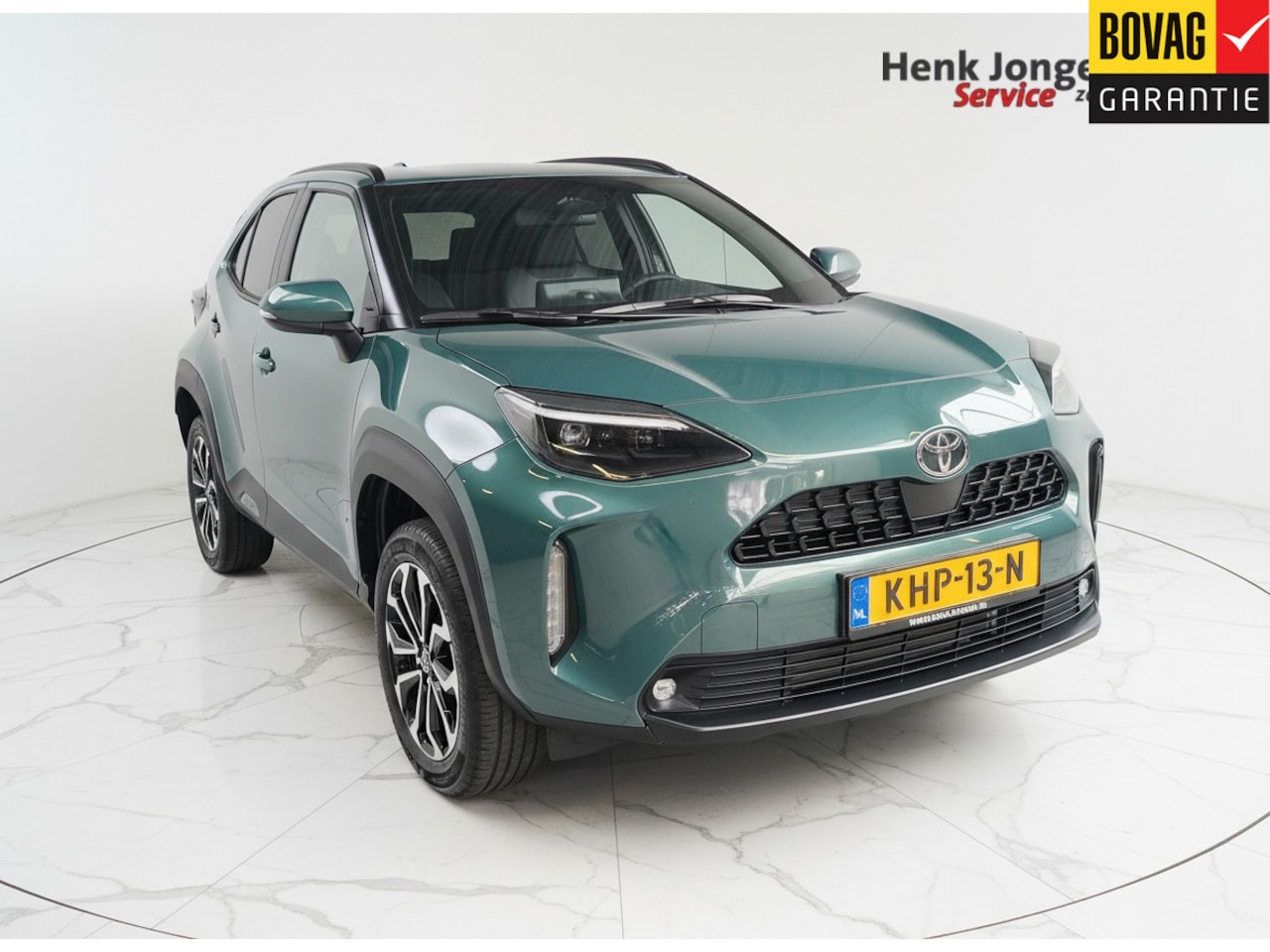 Toyota Yaris Cross - 1.5 Hybrid 115 First Edition Rijklaar + Fabrieksgarantie Henk Jongen Auto's in Helmond,  a - AutoWereld.nl