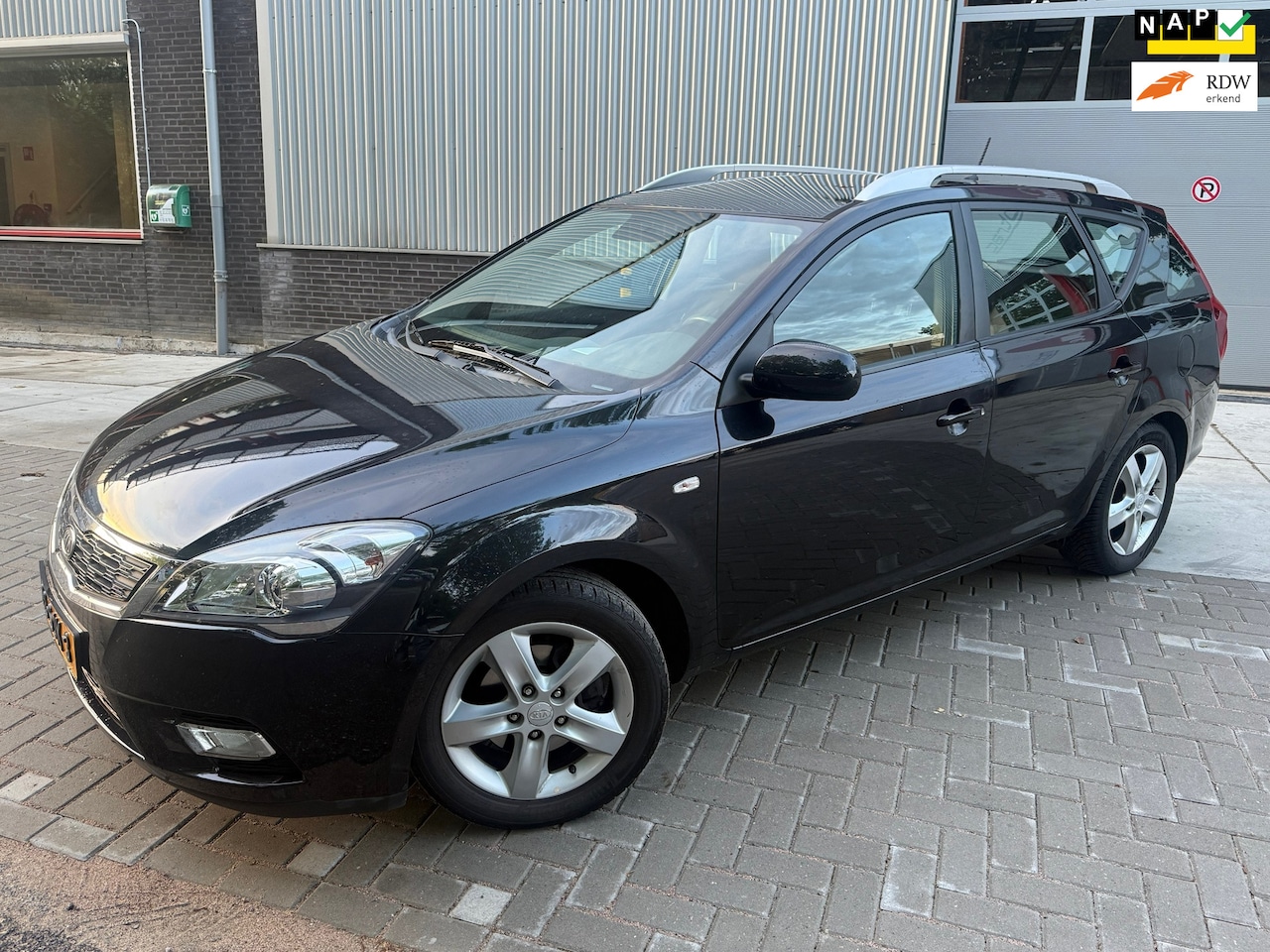 Kia Cee'd Sporty Wagon - 1.4 CVVT X-ecutive 1.4 CVVT X-ecutive - AutoWereld.nl