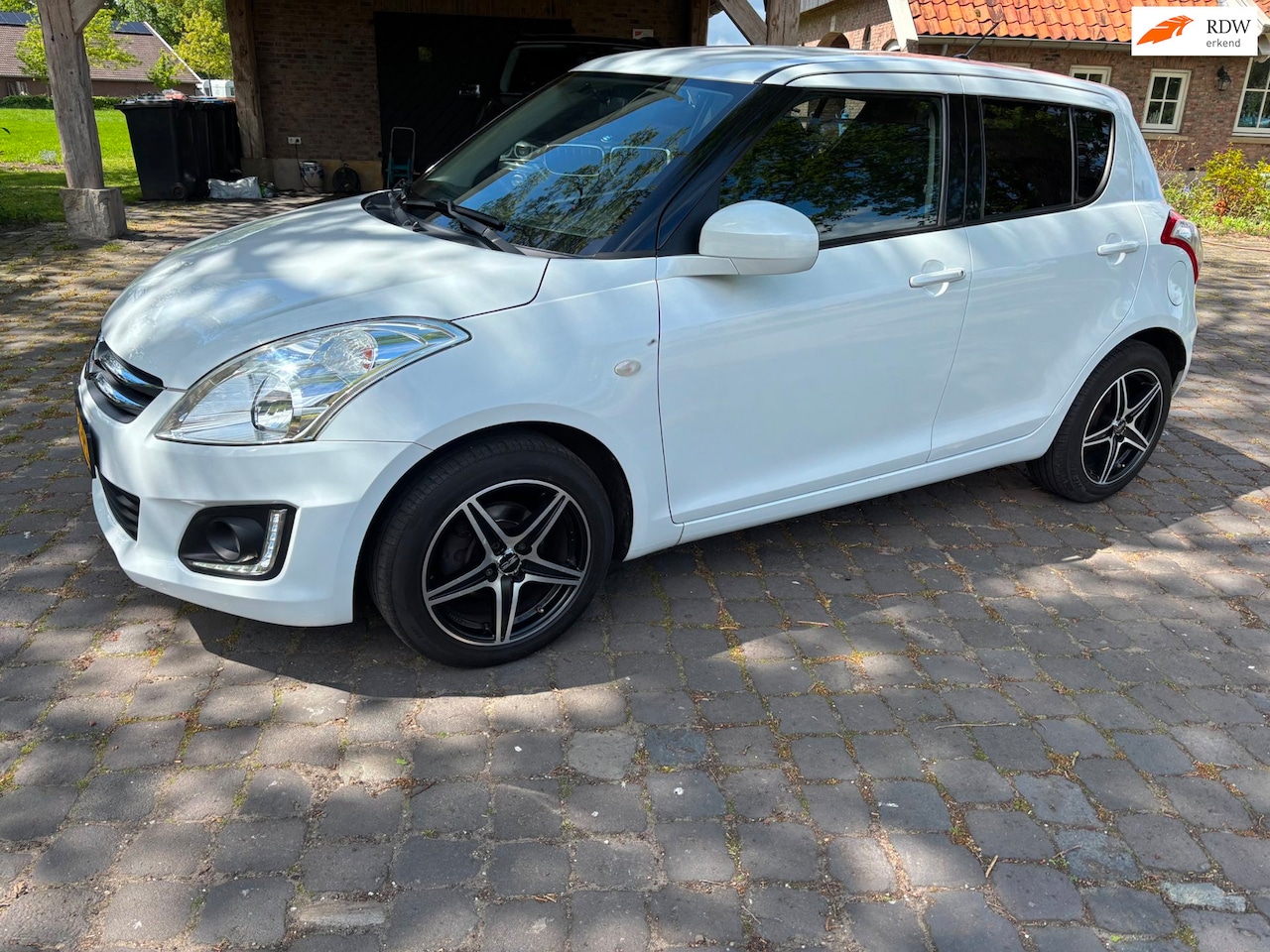 Suzuki Swift - 1.2 X-tra - AutoWereld.nl