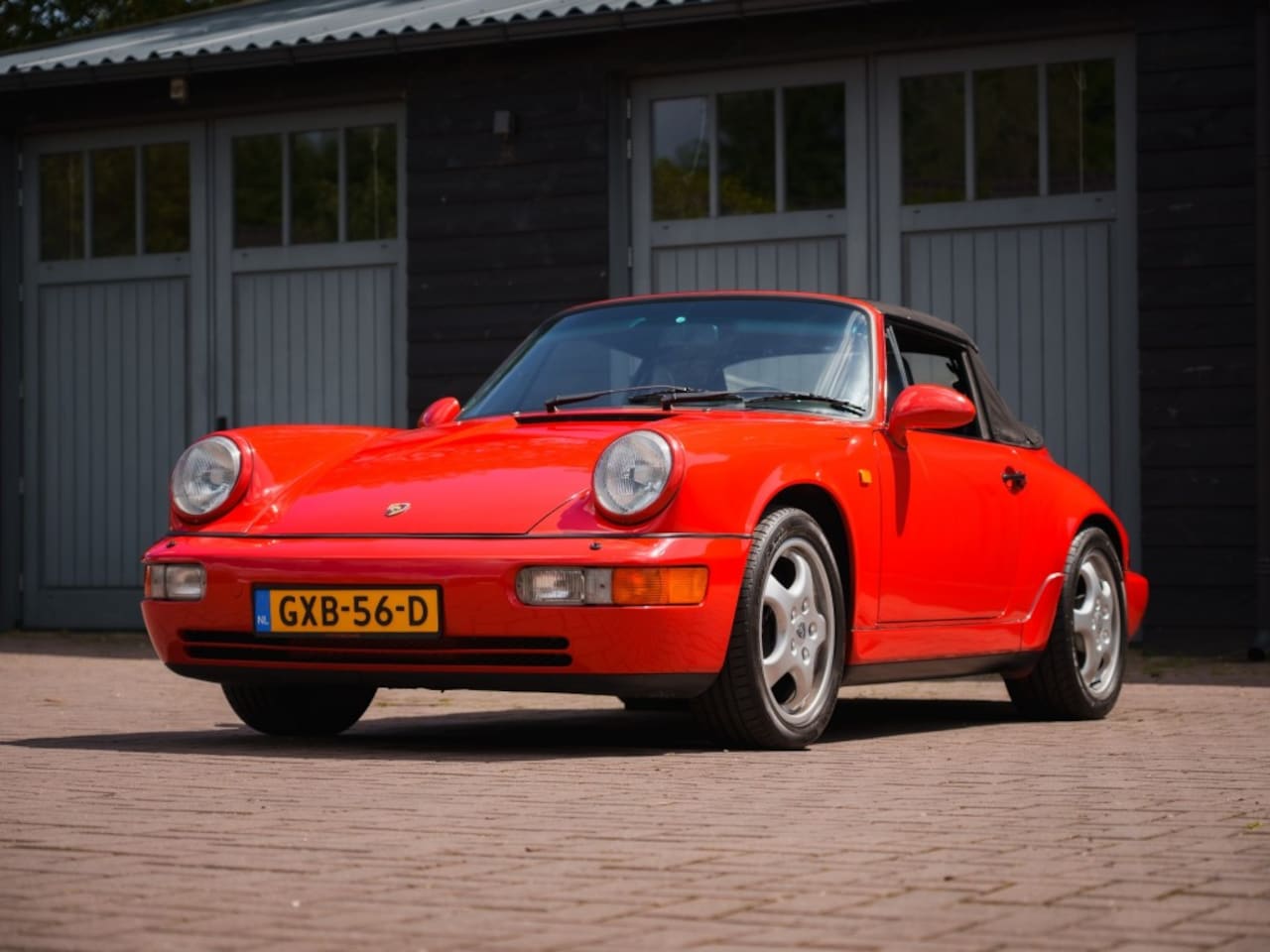 Porsche 911 Cabrio - 911 Carrera 2 Cabriolet 964 – 1993 – Guards Red – Manual - AutoWereld.nl