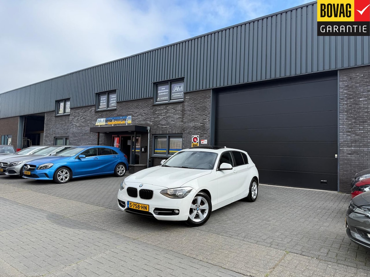 BMW 1-serie - 116i Business+ Limited Edition | 1E EIGENAAR | SCHUIFDAK | AUTOMAAT | NAVI | STOELVERW. | - AutoWereld.nl