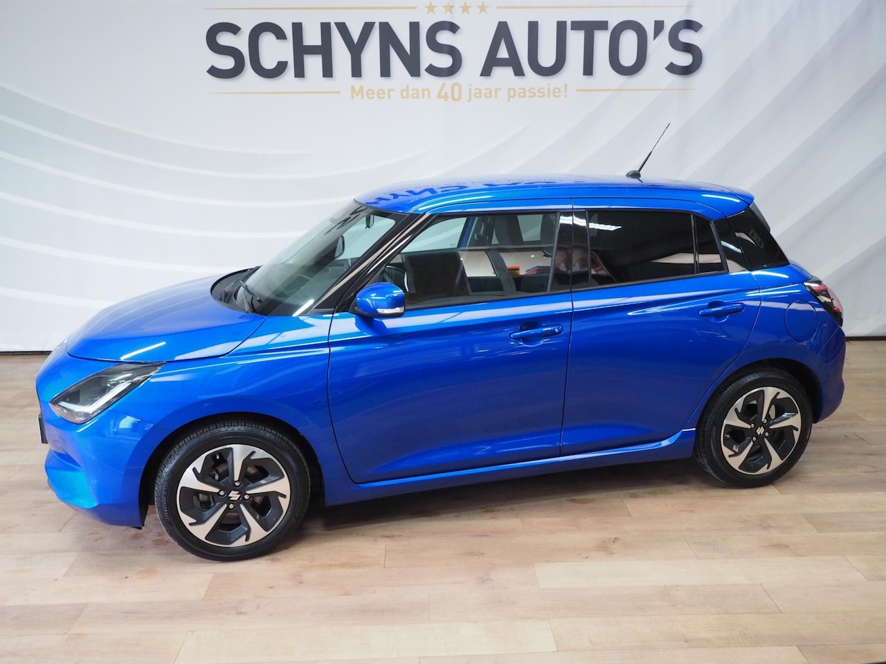 Suzuki Swift - 1.2 Comfort+ Hybrid 10.000KM!/Parkdist/Dodehoek-sensor/Stoelverw/Lane-assist/SafetySystem/ - AutoWereld.nl