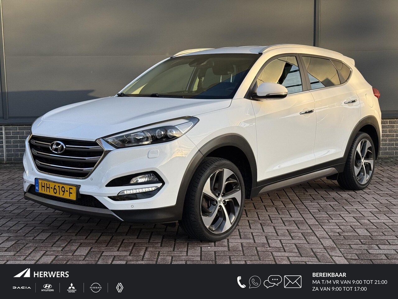 Hyundai Tucson - 1.6 GDi Premium / Trekhaak 1400kg / Navigatie / Lederen bekleding / Stoel Verwarming+Verk - AutoWereld.nl