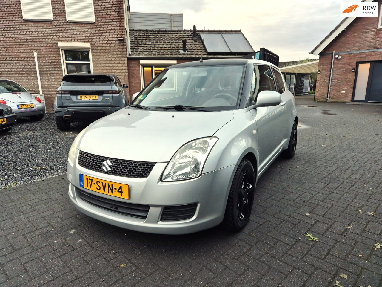 Suzuki Swift - 1.3 Comfort Airco 3 Deurs 15 Inch Sportvelgen - AutoWereld.nl