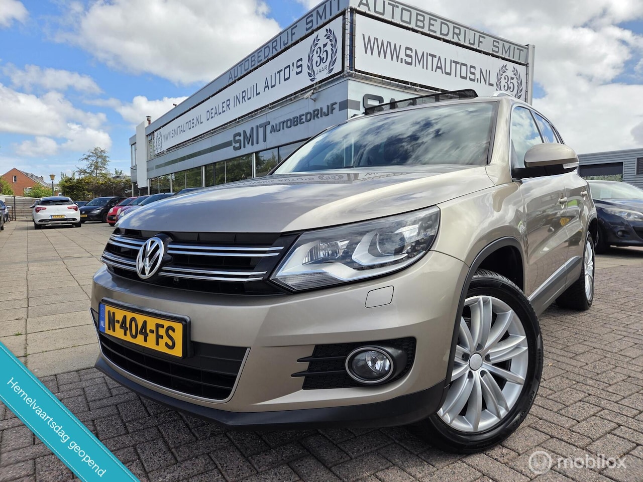 Volkswagen Tiguan - 2.0 TSI 4motion R-line Aut/Pano/Trekhaak - AutoWereld.nl