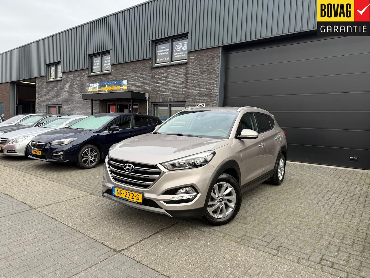 Hyundai Tucson - 1.6 T-GDi Comfort | 2E EIGENAAR | 12MND GARANTIE | NL-AUTO | DAB | AIRCO | CRUISE | STOELV - AutoWereld.nl