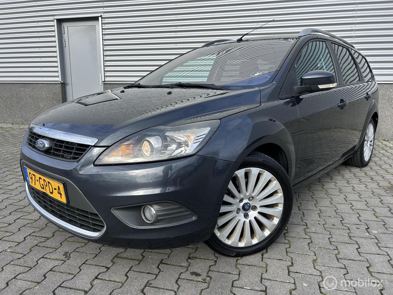 Ford Focus Wagon - 2.0 Titanium 2.0 Titanium,Airco,Cruise,Navi,half-leder - AutoWereld.nl