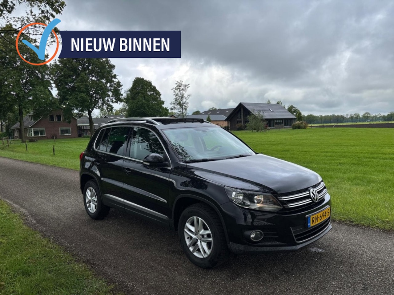 Volkswagen Tiguan - 1.4 TSI Comf.&Design| Pano | Distributieketting is vervangen | S - AutoWereld.nl