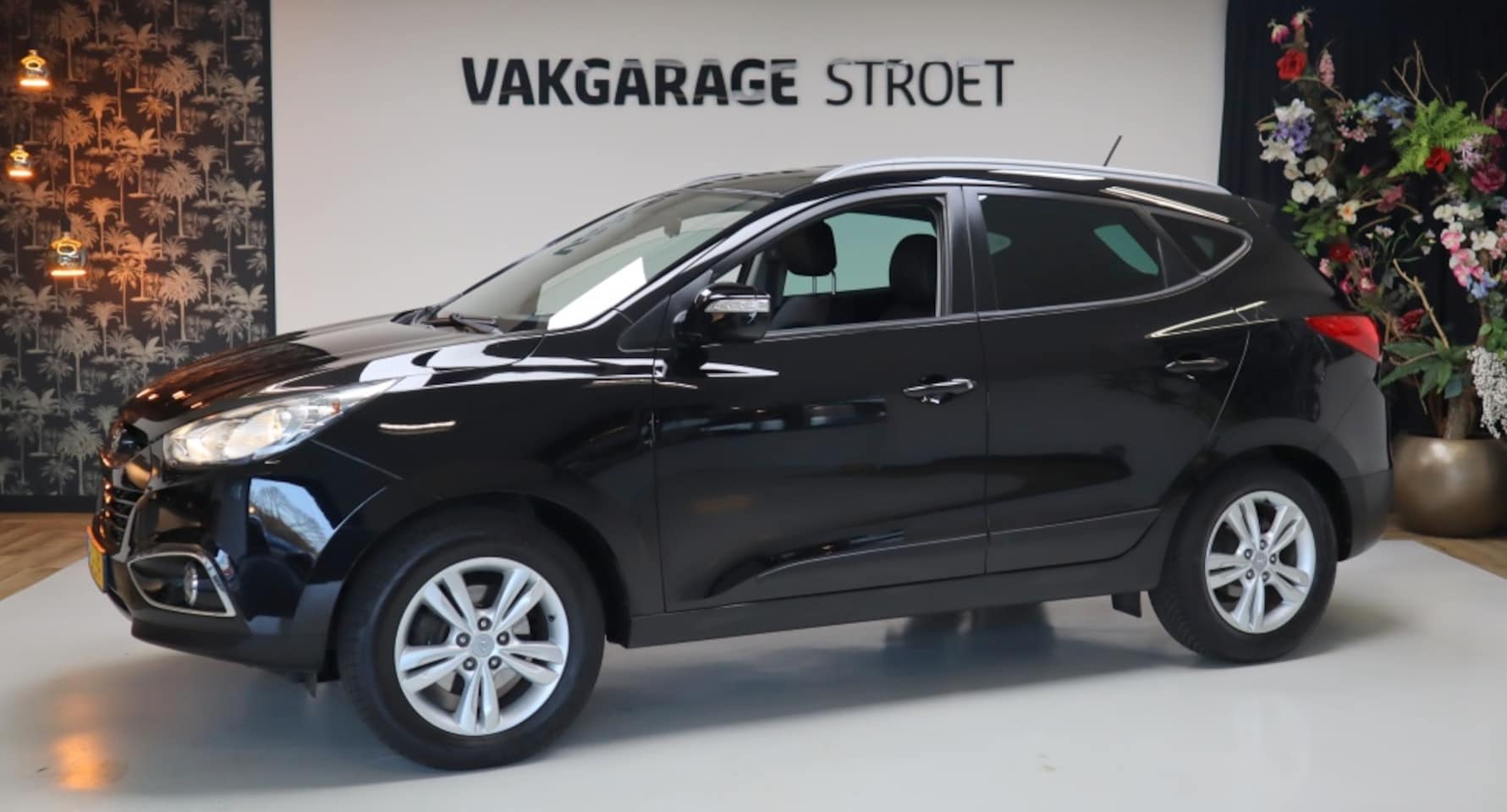Hyundai ix35 - 2.0i Bus.Ed. | cruise | cam | clima | trekhaak | navi | brt - AutoWereld.nl