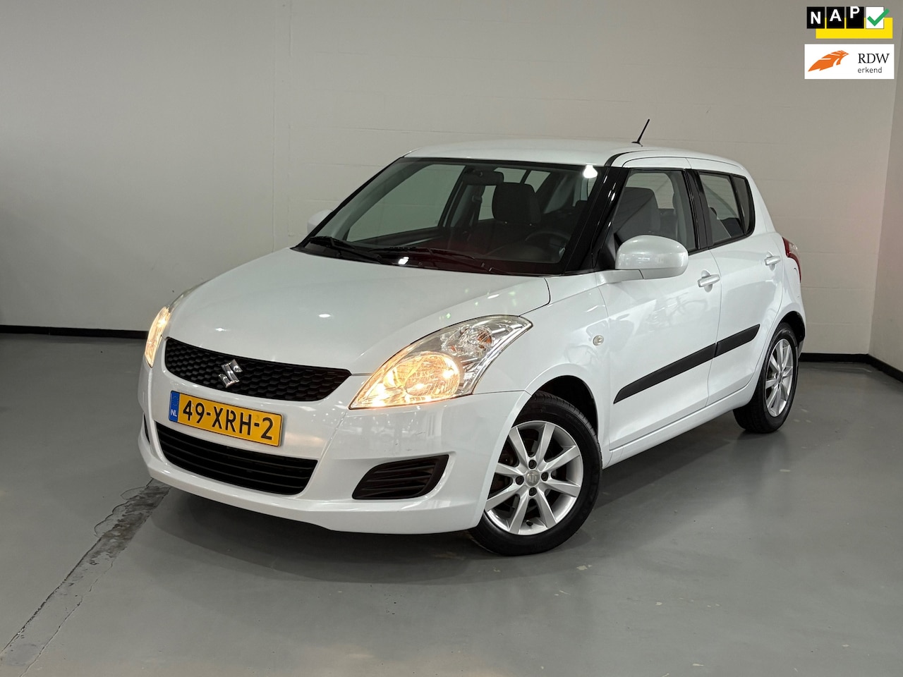 Suzuki Swift - 1.2 Summer EASSS 1.2 Summer EASSS - AutoWereld.nl