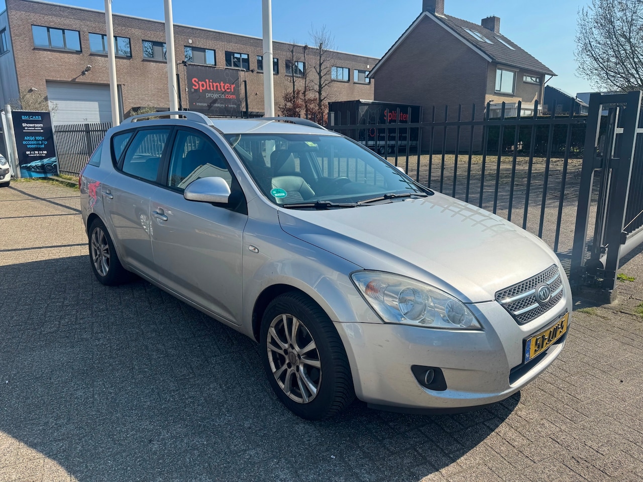 Kia Cee'd Sporty Wagon - 1.4 X-ecutive ISG Airco - AutoWereld.nl