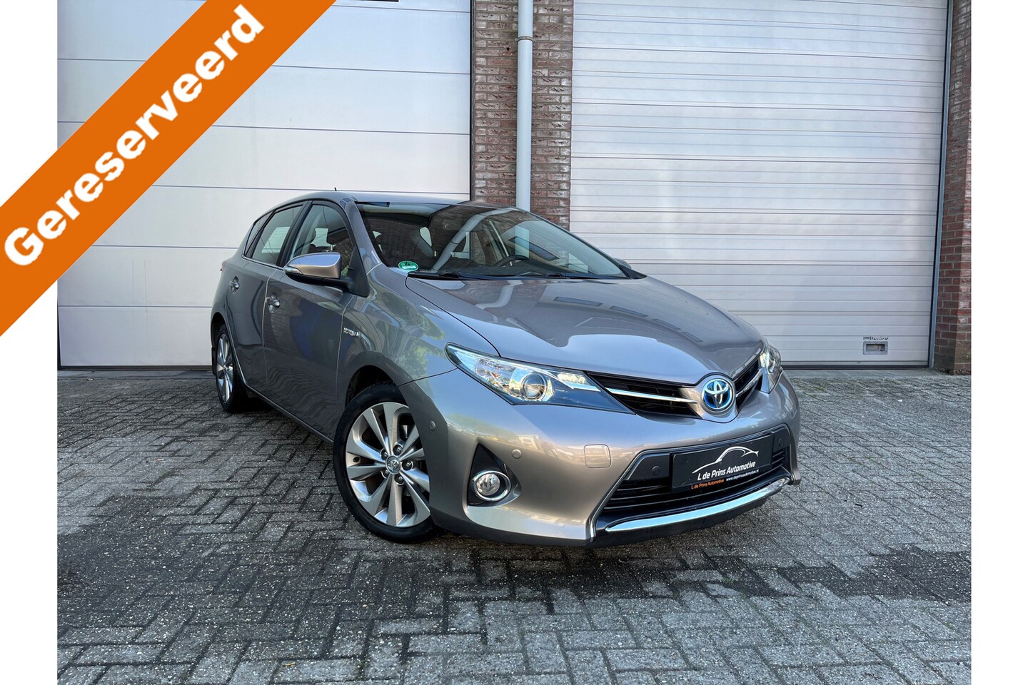 Toyota Auris - 1.8 Hybrid Dynamic Dealer oh/Navi/Camera - AutoWereld.nl