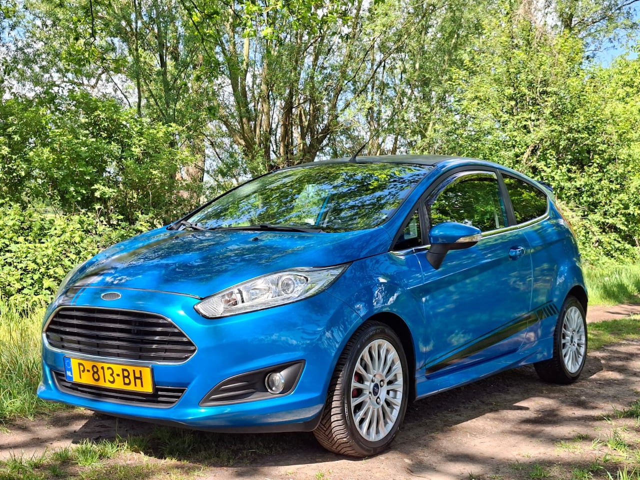 Ford Fiesta - 1.0 EcoBoost Titanium/Stoelverw./NAP/LED/Airco/Elekt.ramen/APK! - AutoWereld.nl