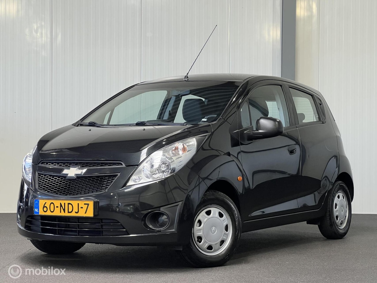 Chevrolet Spark - 1.0 16V L Streetwise [ NAP 1e eigenaar airco ] - AutoWereld.nl
