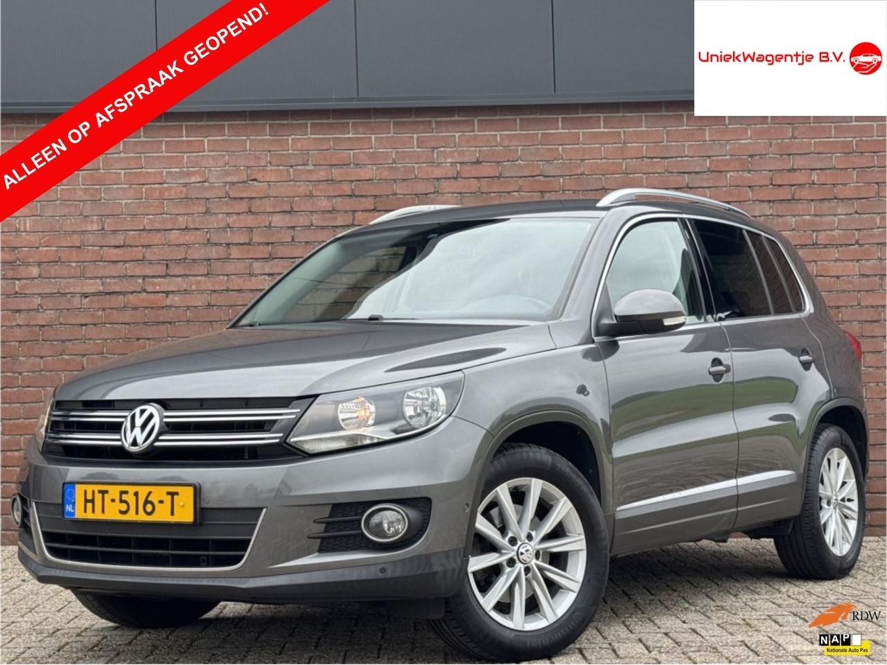 Volkswagen Tiguan - 1.4 TSI SPORT&STYLE | NL-AUTO! | DEALER OH! - AutoWereld.nl