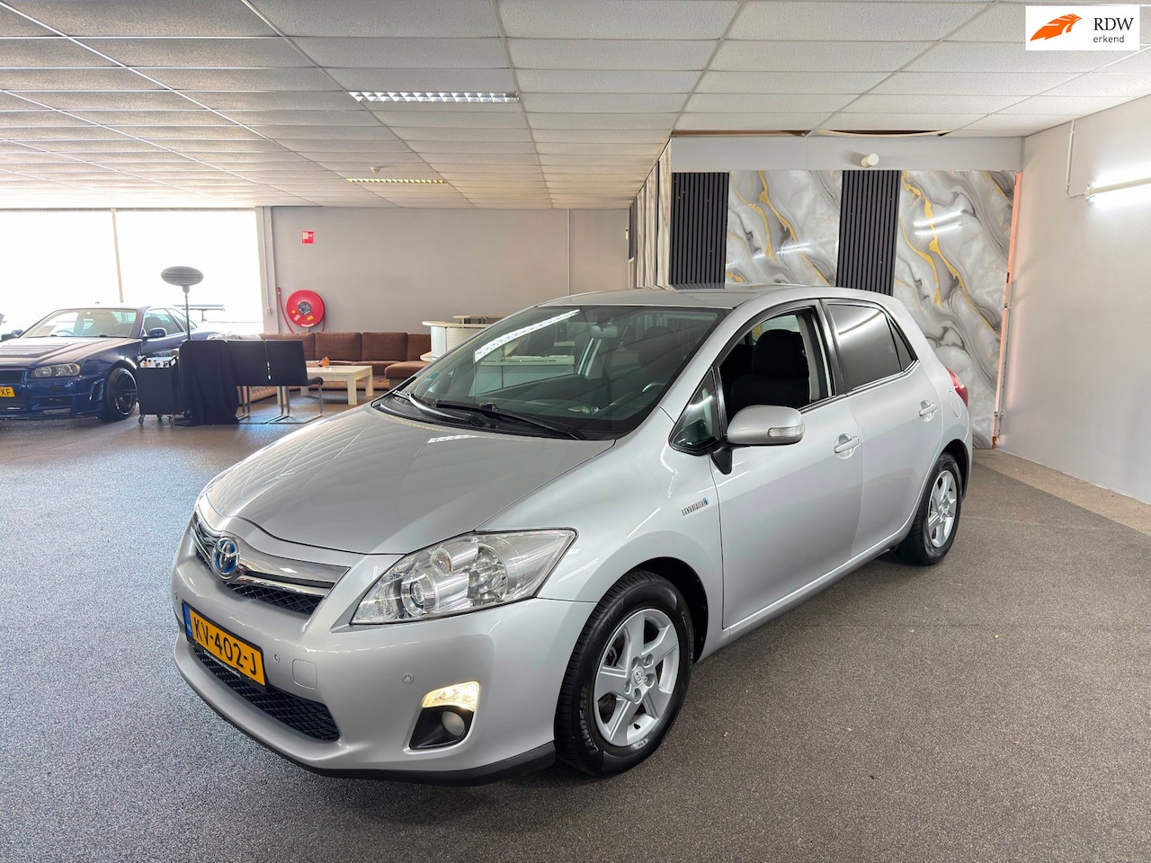 Toyota Auris - 1.8 Full Hybrid Aspiration 1.8 Full Hybrid Aspiration,Clima,Cruise control,Parksensor,N.A.P,Lm velgen,Trekhaak,2 sleu - AutoWereld.nl