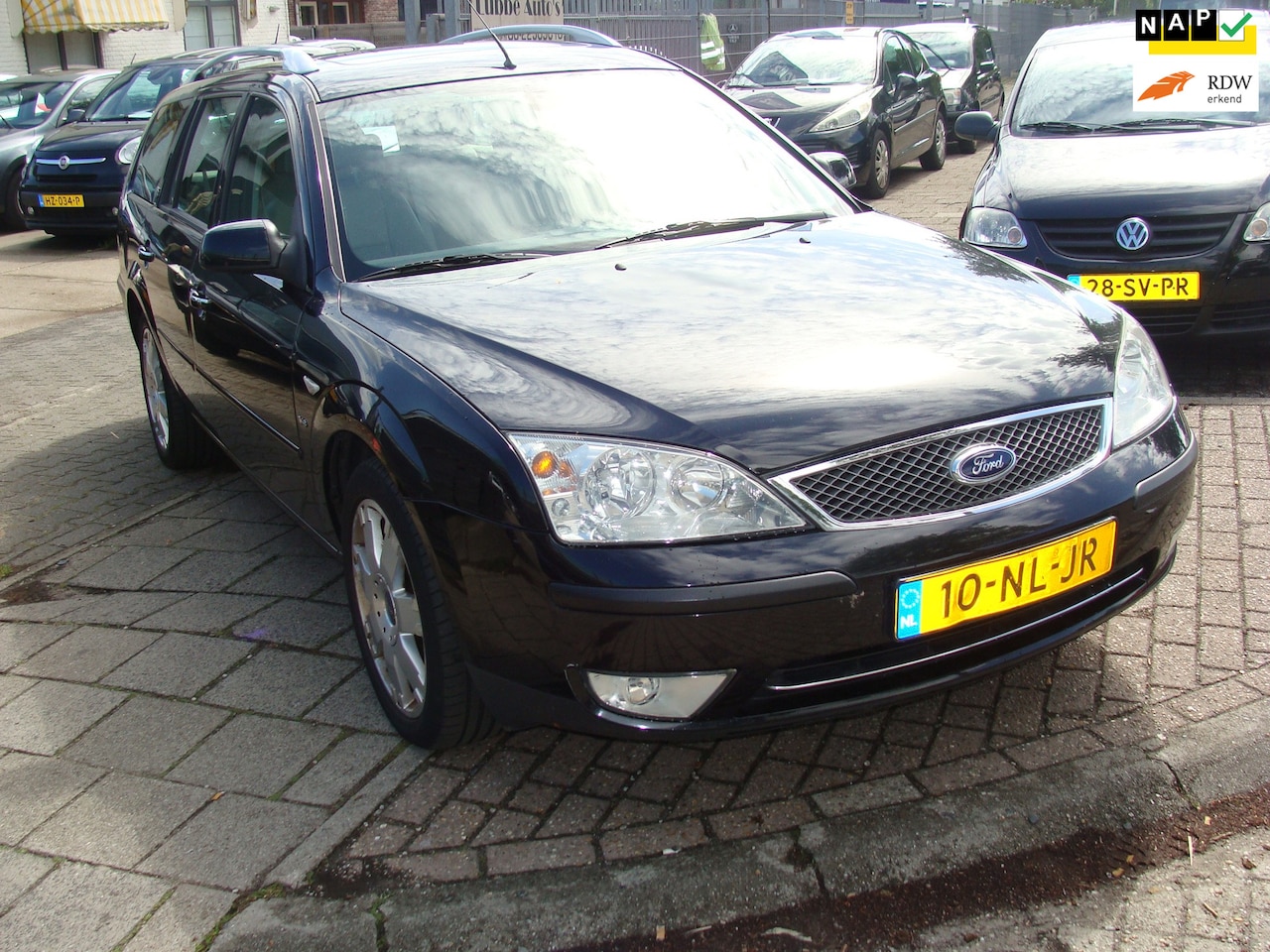 Ford Mondeo Wagon - 2.5 V6 Ghia Executive autom leer airco nap apk - AutoWereld.nl