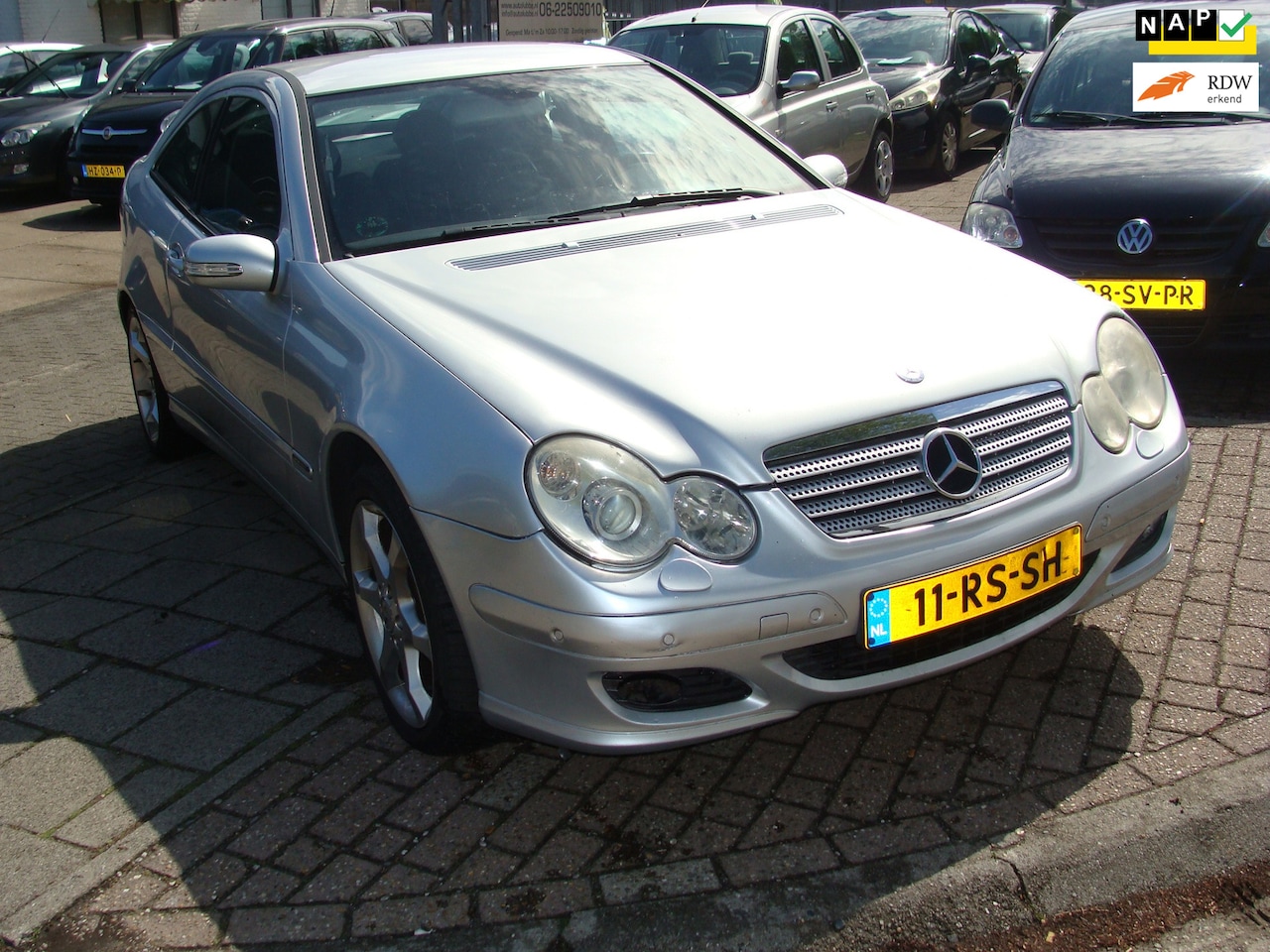 Mercedes-Benz C-klasse Sportcoupé - 160 elegance airco navi nap apk - AutoWereld.nl
