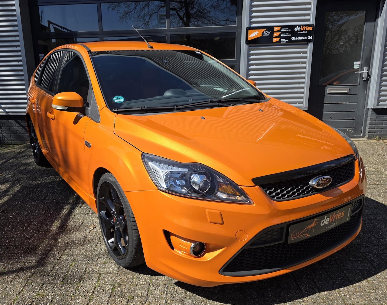 Ford Focus - 2.5 ST **5DRS-226PK-ELECTRICORANGE** - AutoWereld.nl