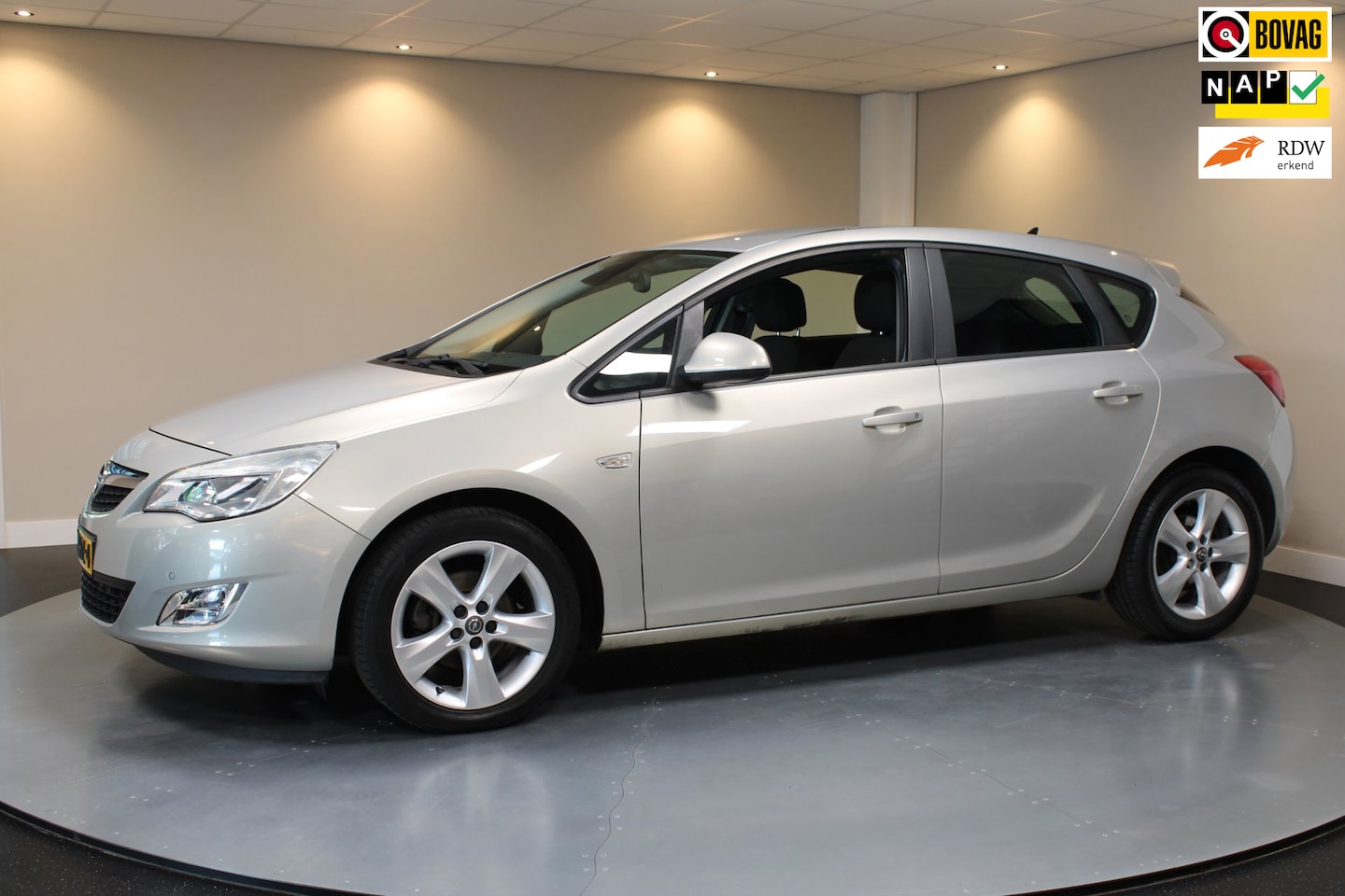 Opel Astra - 1.6 Edition *Top onderhouden* Airco|Navi|Cruise|PDC|NAP - AutoWereld.nl