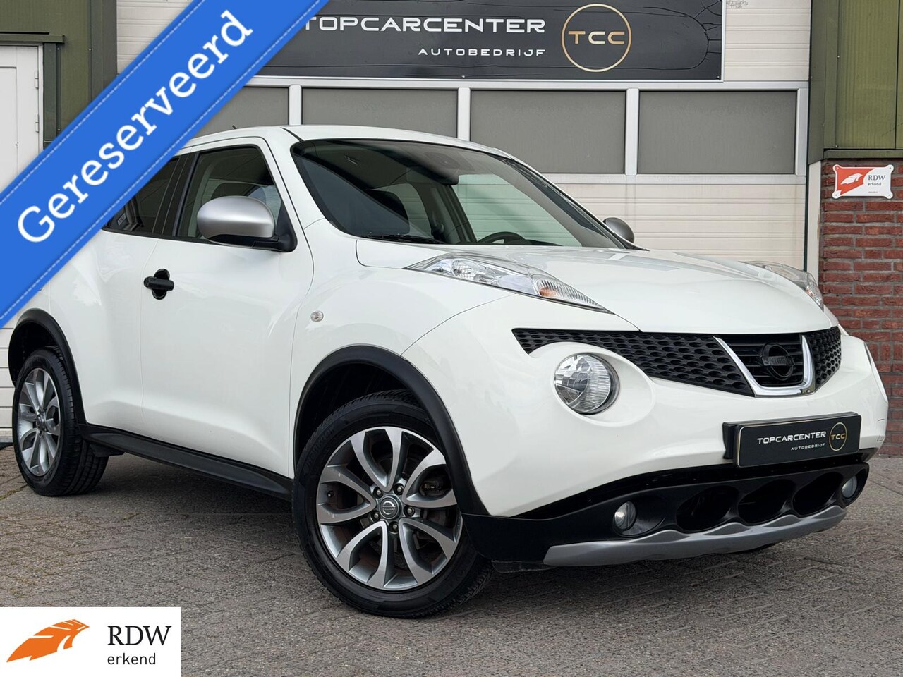 Nissan Juke - 1.6 Urban Premium/AUT/NAVI/LEER/STOELV/APK - AutoWereld.nl