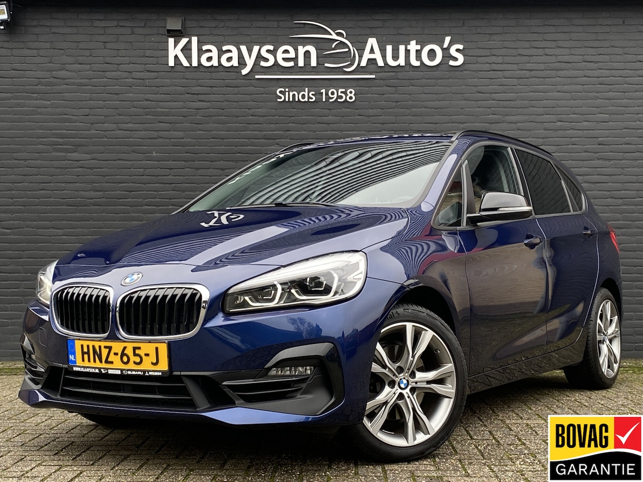 BMW 2-serie Active Tourer - 220i High Executive Edition 192 pk M-sport AUT. | dealer onderhouden | navigatie | trekhaa - AutoWereld.nl
