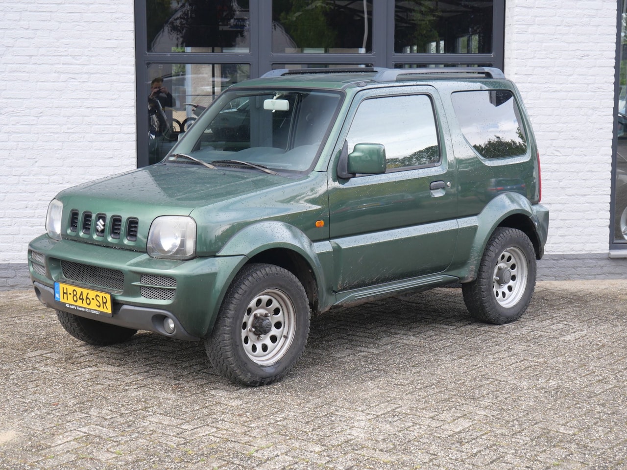 Suzuki Jimny - 1.3 JLX 4x4 Met Laswerk - AutoWereld.nl
