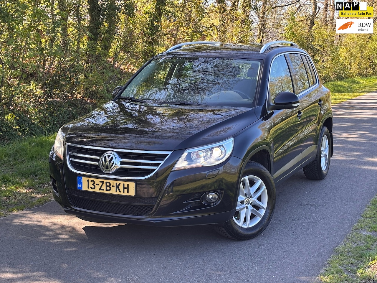Volkswagen Tiguan - 1.4 TSI Sport&Style 4Motion | Cruise + Clima + Trekhaak - AutoWereld.nl