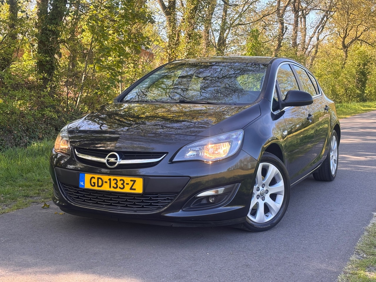 Opel Astra - 1.4 Turbo Blitz | Cruise control + Navi Nu € 3.750,- !!! - AutoWereld.nl