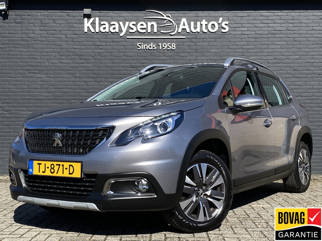 Peugeot 2008 - 1.2 PureTech Allure AUT. | navigatie | afneembare trekhaak | camera | cruise control | all - AutoWereld.nl