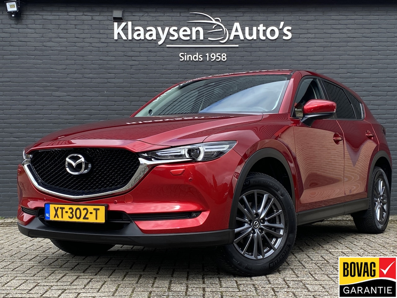 Mazda CX-5 - 2.0 SkyActiv-G 165 Business Comfort AUT. | 1e eigenaar | dealer onderh. | navigatie | trek - AutoWereld.nl