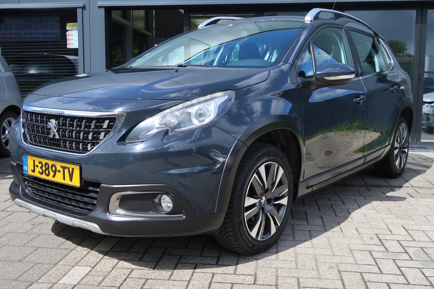 Peugeot 2008 - 1.2 PureTech Allure *Rijklaarprijs *Dealerondehouden *Nieuwe koppeling - AutoWereld.nl