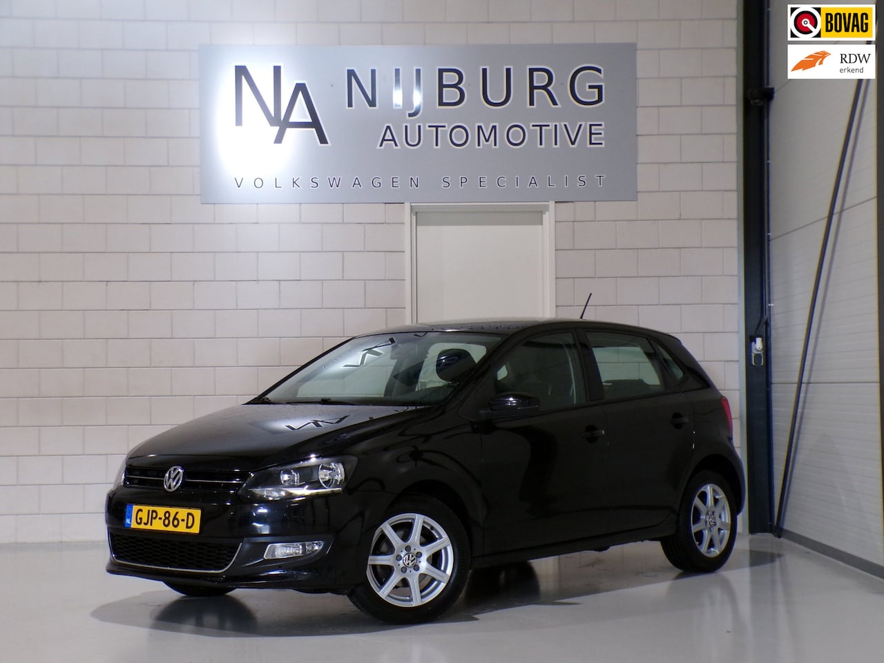Volkswagen Polo - 1.2 Comfortline Stoelverwarming Parkeersensoren Climatronic Navigatie Bluetooth Lichtmetal - AutoWereld.nl