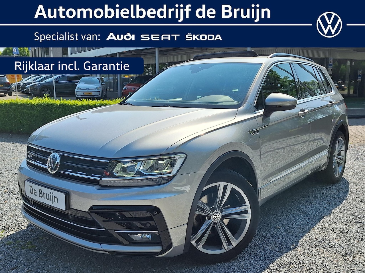 Volkswagen Tiguan - 1.5 TSI 150pk DSG R-Line (Pano,Leer,Navi,Led) - AutoWereld.nl