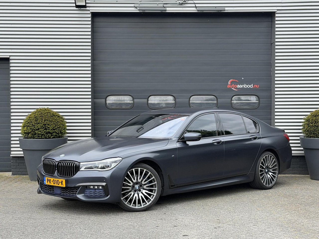 BMW 7-serie - 750d xDrive High Executive M-Sport | 360* Camera | Harmon Kardon | Head-Up Display | Elekt - AutoWereld.nl