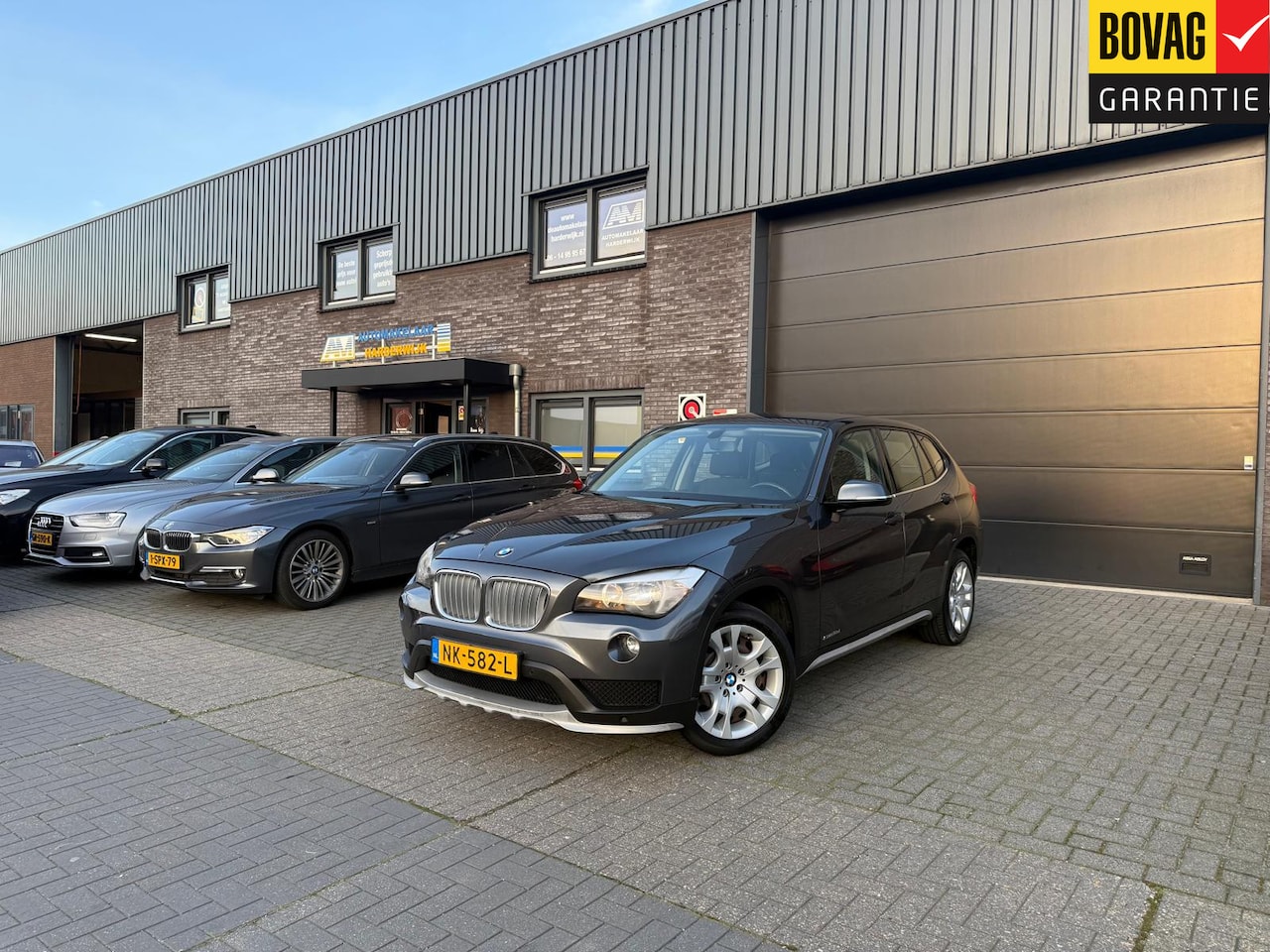 BMW X1 - sDrive18d Executive | 1E EIGENAAR | 12MND GARANTIE | AUTOMAAT | NAVI | CRUISE | TREKHAAK | - AutoWereld.nl